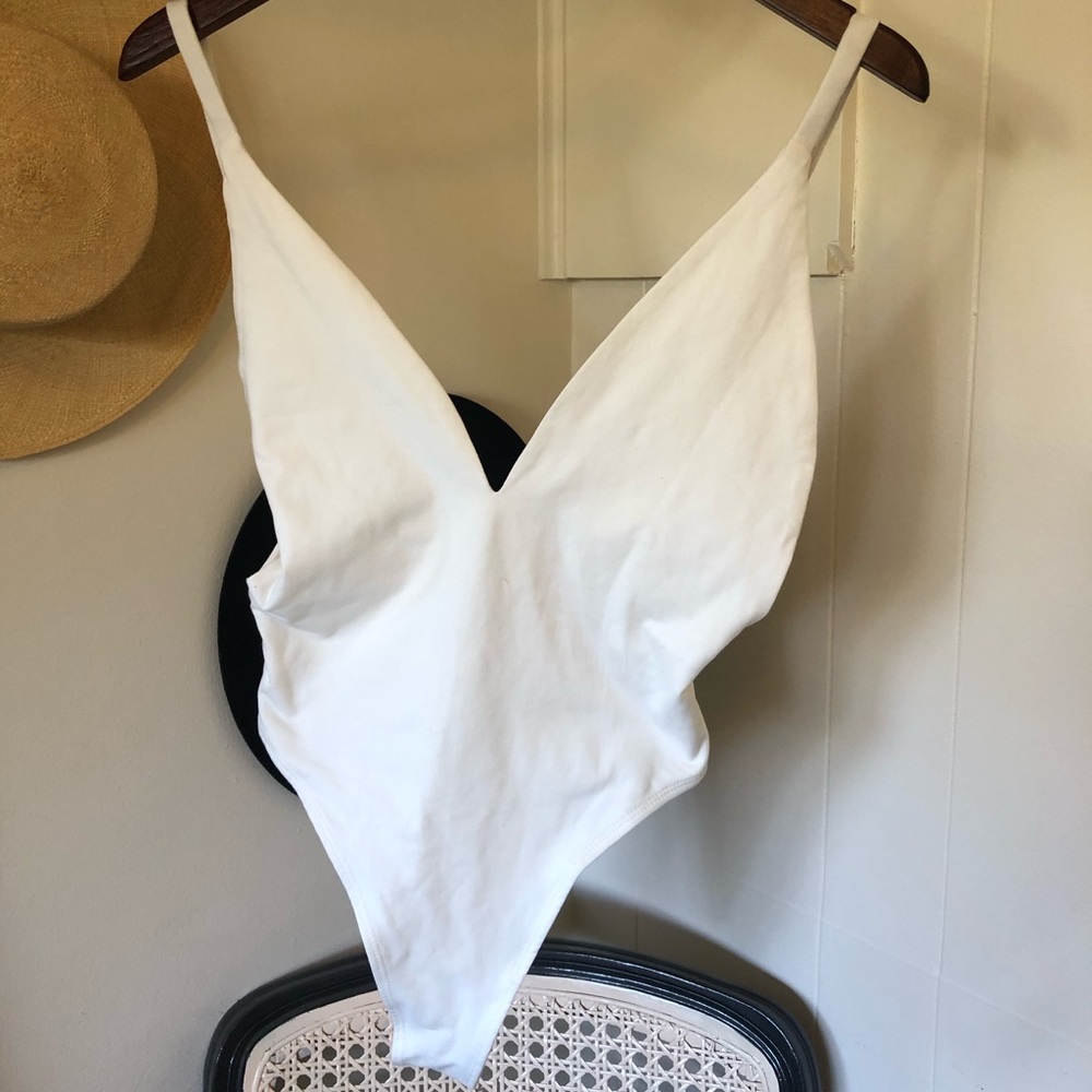 All white body suit! TOBI